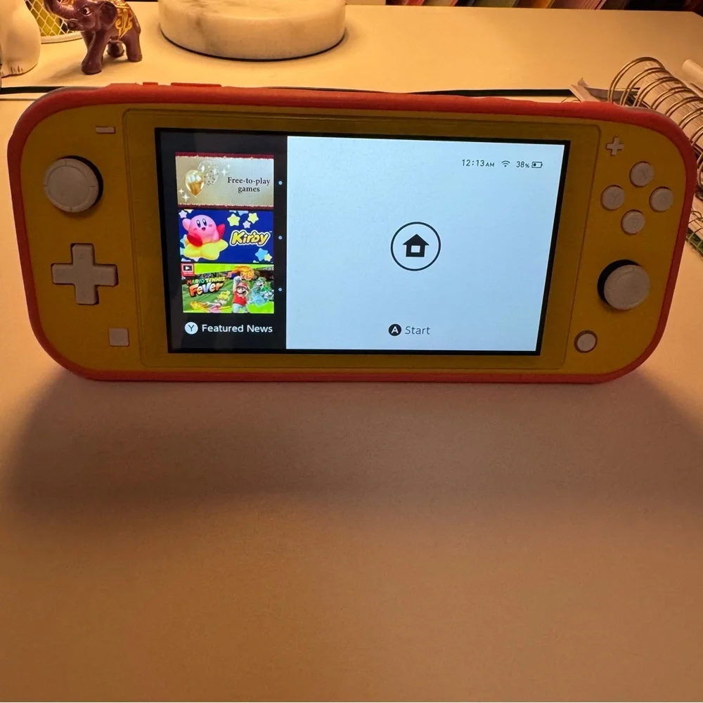 Yellow Nintendo Switch Lite Handheld Console w/ Protective & Travel Case
